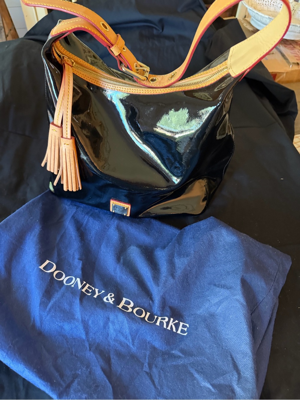 Dooney & Bourke Black Patent Hobo with Tan Trim and Tassel